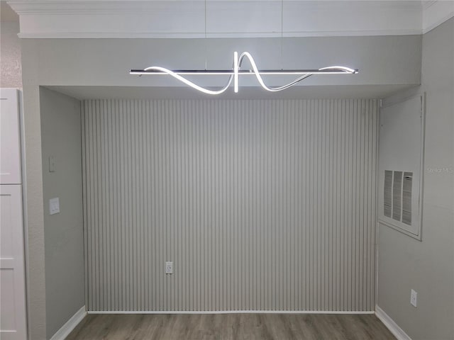 3428 Soho St Unit 208, Orlando, FL 32835 - detailed view of wood finished floors and freestanding refrigerator
