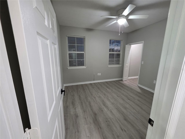 3428 Soho St Unit 208, Orlando, FL 32835 - spare room with ceiling fan and wood finished floors