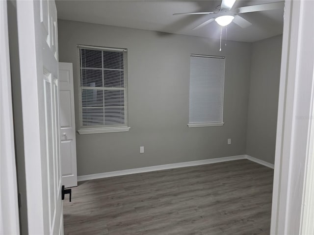 3428 Soho St Unit 208, Orlando, FL 32835 - unfurnished room with wood finished floors and ceiling fan