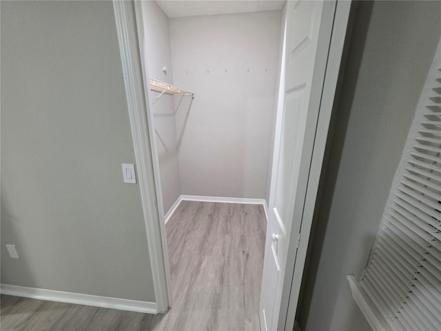 3428 Soho St Unit 208, Orlando, FL 32835 - spacious closet featuring wood finished floors