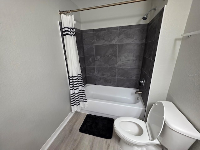 3428 Soho St Unit 208, Orlando, FL 32835 - bathroom with shower / bath combination with curtain and wood finished floors