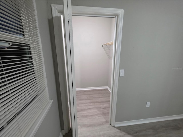 3428 Soho St Unit 208, Orlando, FL 32835 - corridor featuring baseboards and a heating unit