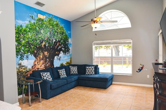 2807 Playing Otter Ct, Kissimmee, FL 34747 - living room featuring ceiling fan, high vaulted ceiling, and light tile patterned floors