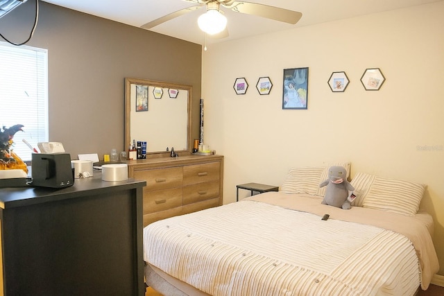 423 Midway Ave, Mascotte, FL 34753 - bedroom with a ceiling fan