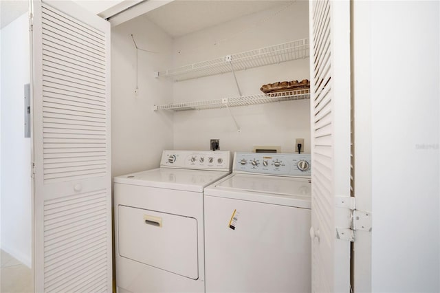 17340 Boca Club Blvd Unit 703, Boca Raton, FL 33487 - washroom featuring washing machine and dryer