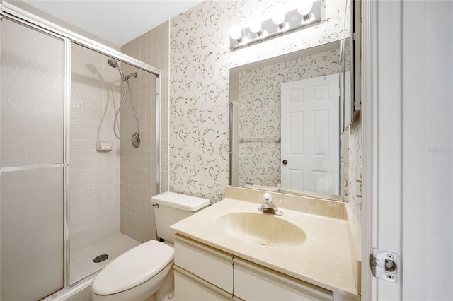 17340 Boca Club Blvd Unit 703, Boca Raton, FL 33487 - bathroom featuring wallpapered walls, a shower stall, and vanity