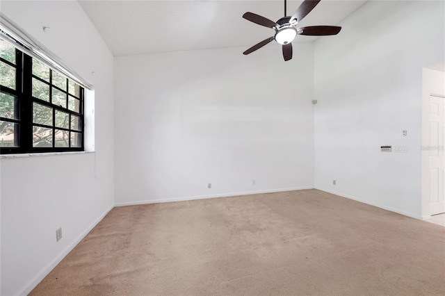 17340 Boca Club Blvd Unit 703, Boca Raton, FL 33487 - empty room featuring ceiling fan, light colored carpet, and high vaulted ceiling