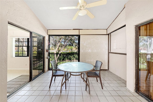 17340 Boca Club Blvd Unit 703, Boca Raton, FL 33487 - sunroom / solarium featuring vaulted ceiling, a ceiling fan, outdoor dining space, tile patterned flooring, and a textured wall
