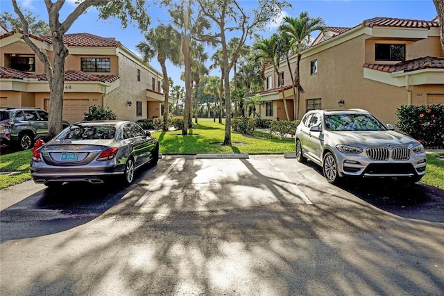 17340 Boca Club Blvd Unit 703, Boca Raton, FL 33487 - view of asphalt road with a residential view