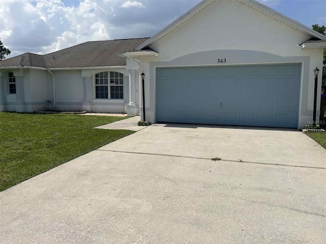 343 Marquee Dr, Kissimmee, FL 34758 - single story home featuring stucco siding, concrete driveway, a garage, and a front yard