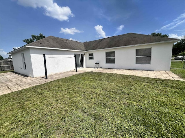 343 Marquee Dr, Kissimmee, FL 34758 - back of property featuring a patio area and stucco siding