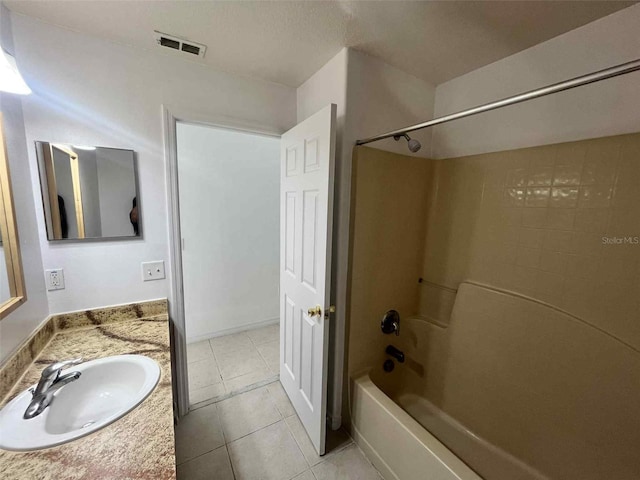 343 Marquee Dr, Kissimmee, FL 34758 - full bathroom featuring vanity, shower / bath combination, and tile patterned flooring