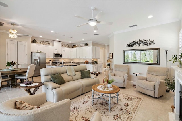 2772 Southland St, Saint Cloud, FL 34772 - living room with ceiling fan, ornamental molding, light tile patterned floors, and recessed lighting