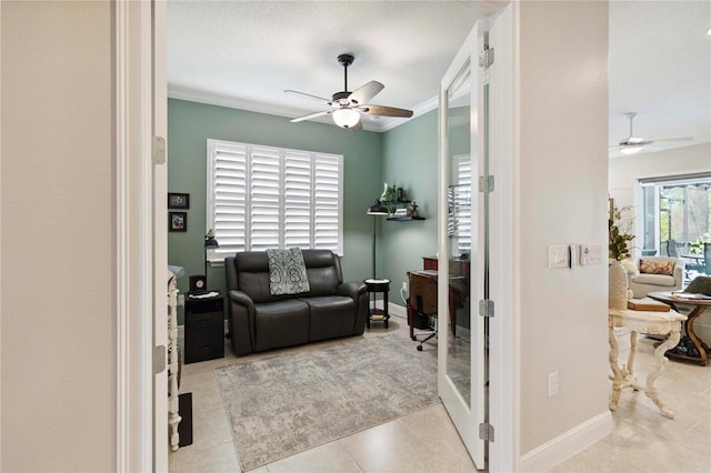 2772 Southland St, Saint Cloud, FL 34772 - living room with ceiling fan, tile patterned floors, and crown molding