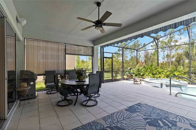 2772 Southland St, Saint Cloud, FL 34772 - sunroom / solarium with a jacuzzi, a ceiling fan, and outdoor dining area