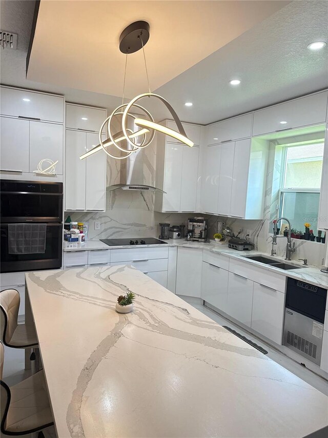 2805 Carter Grove Ln, Kissimmee, FL 34741 - kitchen featuring modern cabinets, black appliances, white cabinets, wall chimney exhaust hood, and recessed lighting