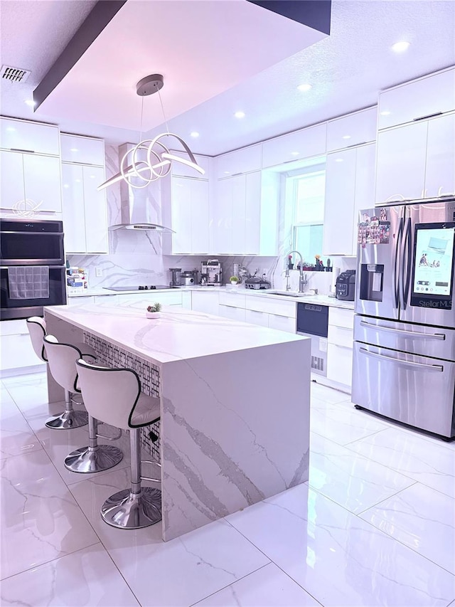 2805 Carter Grove Ln, Kissimmee, FL 34741 - kitchen featuring stainless steel refrigerator with ice dispenser, modern cabinets, white cabinets, and recessed lighting