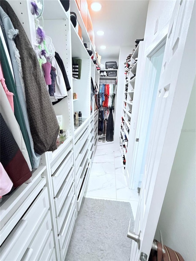 2805 Carter Grove Ln, Kissimmee, FL 34741 - spacious closet with light marble finish flooring