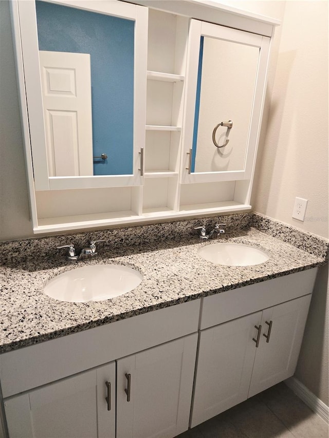 3839 Marbella Way, Davenport, FL 33897 - bathroom featuring double vanity and tile patterned floors