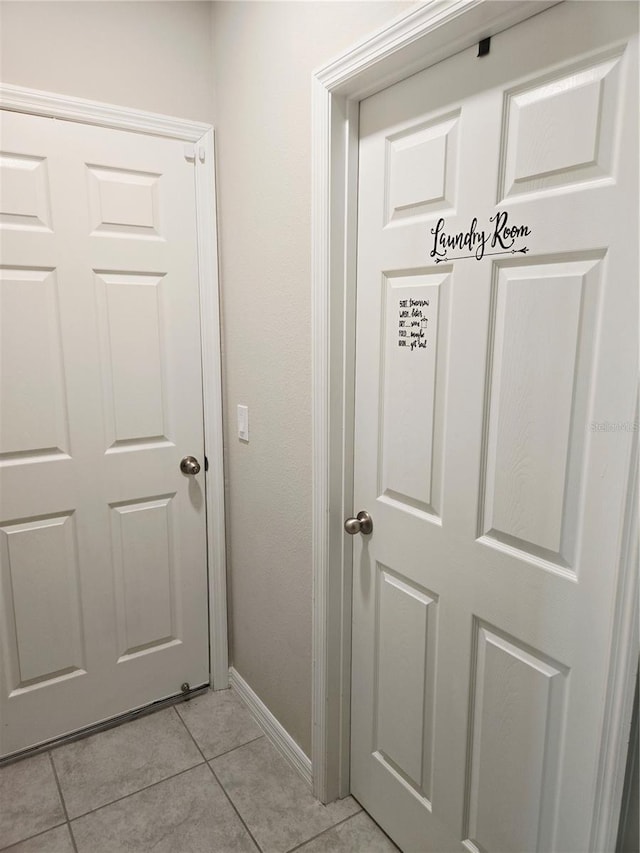 3839 Marbella Way, Davenport, FL 33897 - entryway featuring light tile patterned flooring and baseboards