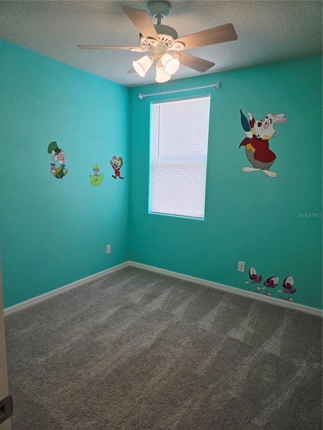 3839 Marbella Way, Davenport, FL 33897 - carpeted spare room featuring a textured ceiling and ceiling fan