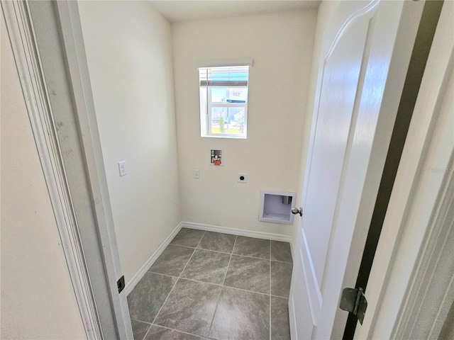 1370 Holodak Dr, Davenport, FL 33837 - laundry area with hookup for an electric dryer, washer hookup, and tile patterned flooring