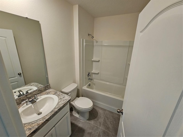 1370 Holodak Dr, Davenport, FL 33837 - full bathroom with vanity, tile patterned flooring, shower / bath combination, and a textured ceiling