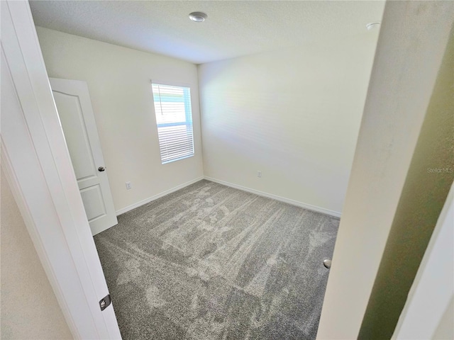 1370 Holodak Dr, Davenport, FL 33837 - unfurnished room with carpet floors and baseboards