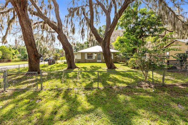 1101 Oregon Ave, Saint Cloud, FL 34769 - view of yard featuring a gate