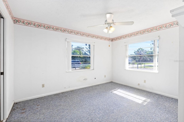 1101 Oregon Ave, Saint Cloud, FL 34769 - carpeted spare room with ceiling fan and baseboards