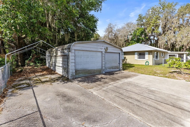 1101 Oregon Ave, Saint Cloud, FL 34769 - detached garage featuring driveway