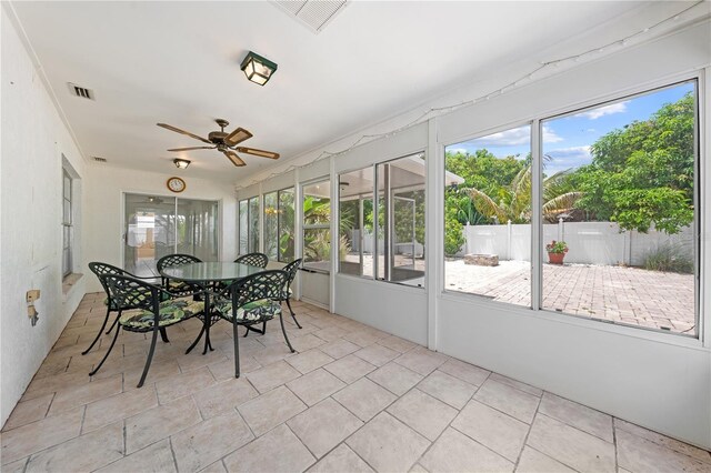 2637 Debany Rd, Kissimmee, FL 34744 - sunroom / solarium featuring ceiling fan and outdoor dining space