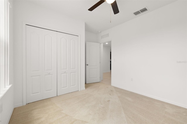 371 Pinecrest Loop, Davenport, FL 33837 - unfurnished bedroom featuring carpet floors, a closet, and ceiling fan