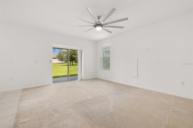 371 Pinecrest Loop, Davenport, FL 33837 - unfurnished room with ceiling fan and light carpet