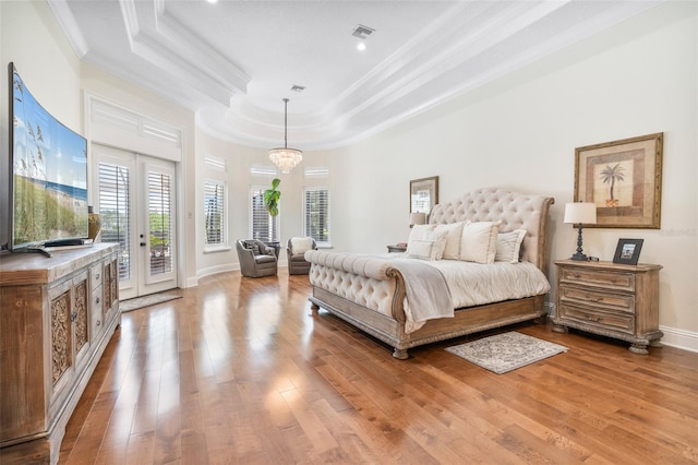 9905 Lanai View Ct, Windermere, FL 34786 - bedroom with crown molding, access to exterior, light wood-type flooring, a chandelier, and recessed lighting