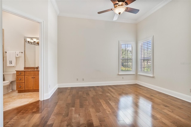 9905 Lanai View Ct, Windermere, FL 34786 - unfurnished bedroom with ornamental molding, wood finished floors, ensuite bath, and a ceiling fan