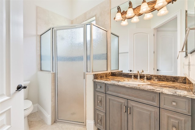 9905 Lanai View Ct, Windermere, FL 34786 - full bathroom with vanity, a stall shower, a chandelier, and tile patterned flooring