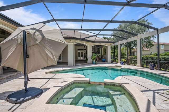 9905 Lanai View Ct, Windermere, FL 34786 - view of pool featuring french doors, a patio area, a pool with connected hot tub, and glass enclosure