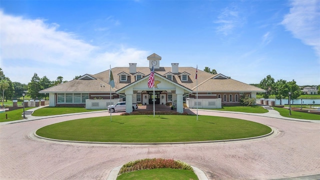 9905 Lanai View Ct, Windermere, FL 34786 - view of building exterior with curved driveway