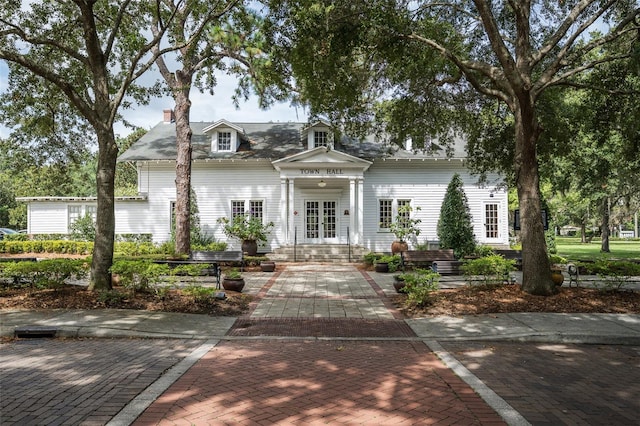 9905 Lanai View Ct, Windermere, FL 34786 - view of front of house with french doors and a chimney