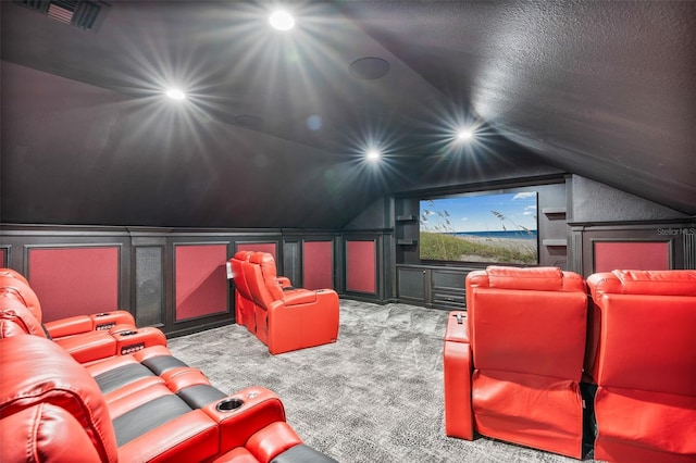 9905 Lanai View Ct, Windermere, FL 34786 - cinema with vaulted ceiling, carpet floors, recessed lighting, and a decorative wall