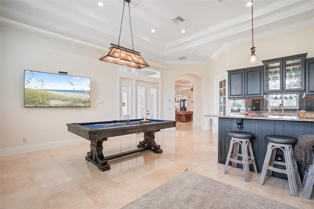 9905 Lanai View Ct, Windermere, FL 34786 - rec room with billiards table, arched walkways, ornamental molding, a raised ceiling, and recessed lighting