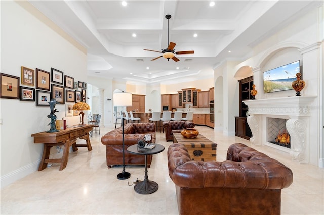 9905 Lanai View Ct, Windermere, FL 34786 - living room with a ceiling fan, recessed lighting, coffered ceiling, beam ceiling, and a fireplace with flush hearth
