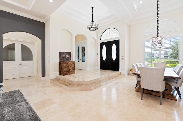 9905 Lanai View Ct, Windermere, FL 34786 - entryway with a chandelier, crown molding, french doors, recessed lighting, and arched walkways