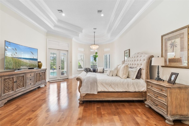 9905 Lanai View Ct, Windermere, FL 34786 - bedroom featuring access to outside, a tray ceiling, crown molding, hardwood / wood-style flooring, and recessed lighting