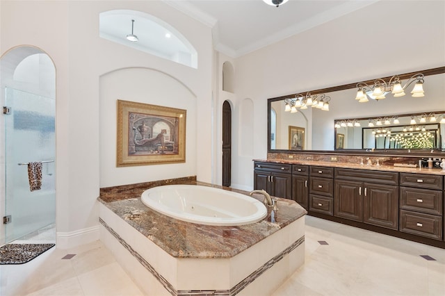9905 Lanai View Ct, Windermere, FL 34786 - full bath with a shower stall, double vanity, a jetted tub, crown molding, and tile patterned floors