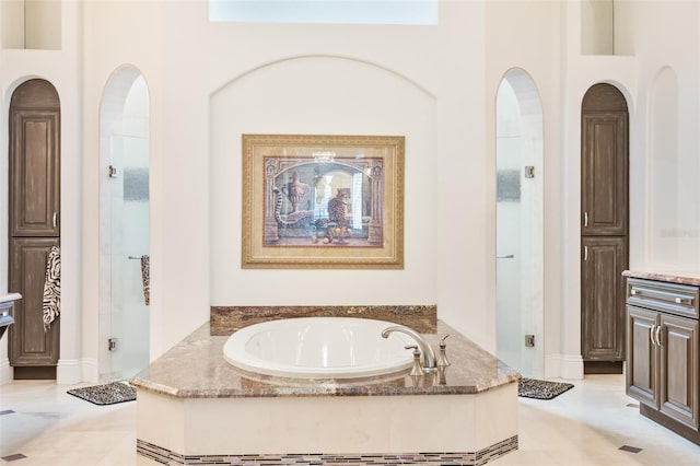 9905 Lanai View Ct, Windermere, FL 34786 - bathroom with a bath and a shower stall