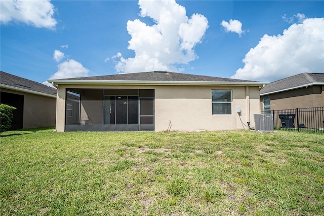 4928 Cortland Dr, Davenport, FL 33837 - rear view of house featuring stucco siding and a sunroom