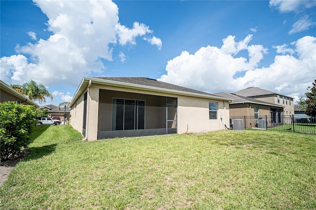 4928 Cortland Dr, Davenport, FL 33837 - back of property featuring stucco siding and a sunroom