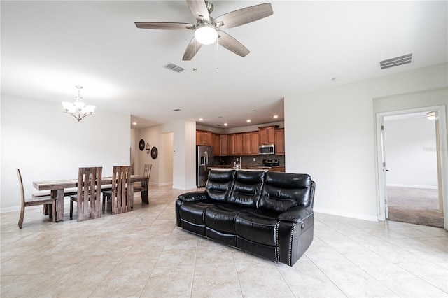 4928 Cortland Dr, Davenport, FL 33837 - living area featuring a chandelier, light tile patterned floors, a ceiling fan, and recessed lighting